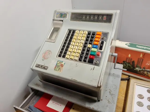cash register and card reader at a shop counter