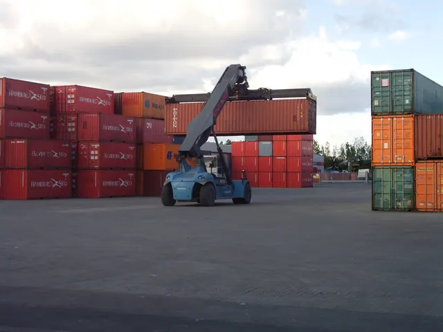 container terminal cranes moving shipping containers